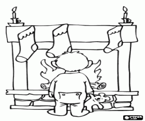 desenho de Crian�a na frente da lareira com as meias penduradas na v�spera de Natal para colorir