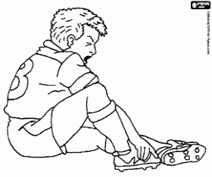 desenho de Jogador de futebol ferido para colorir