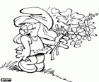 Smurfette com um buquê de flores