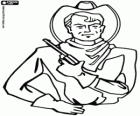 Um cowboy com o revólver na mão